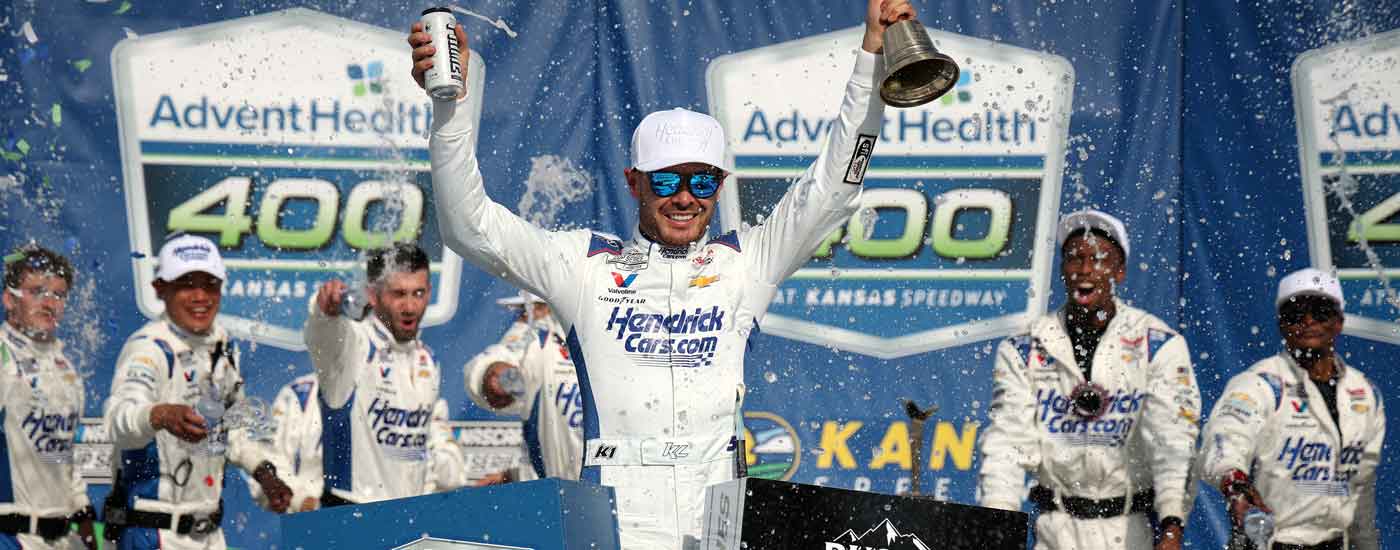 KANSAS CITY, KANSAS - MAY 11: Kyle Larson, driver of the #5 HendrickCars.com Chevrolet, celebrates in victory lane after winning the NASCAR Cup Series AdventHealth 400 at Kansas Speedway on May 11, 2025 in Kansas City, Kansas. (Photo by Chris Graythen/Getty Images)