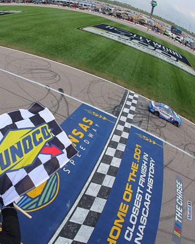 Kyle Larson crosses the start/finish line at Kansas.